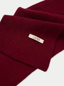 Maroon knit scarf with 'Gobi' label on a light gray background #color_bordeaux