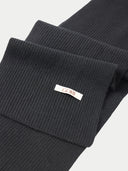 Black ribbed knit scarf with 'Gobi' label on a light gray background #color_black
