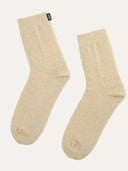 Pair of beige socks on a white background. #color_beige