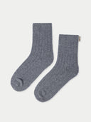flat lay of gray pair of socks