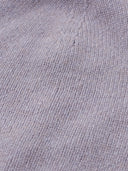 Close-up of a textured gray purple fabric surface #color_purple-ash