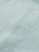 Close-up of a light blue fabric texture #color_cloud-blue