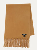 Brown scarf with fringes and a brand label on a white background. #color_almond
