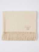 Beige scarf with fringe on a white background