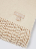 Beige scarf with fringe detail and 'Gobi Organic' label on a light background