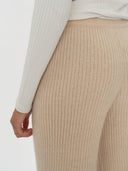back view of a beige ribbed cashmere pants #color_beige