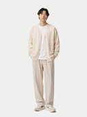 front view of a beige cardigan and pants on a white background #color_off-white
