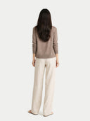 back view of a brown sweater and beige pants on a white background #color_taupe