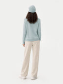 back view of a light blue sweater and beige pants on a white background #color_cloud-blue