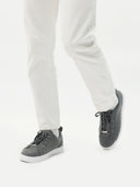 front view of a beige sneakers with white pants#color_stone-gray