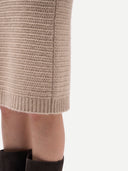 Close-up of a beige knitted skirt on a white background #color_fog