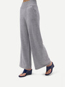 Gray sweatpants worn by a person on a white background  #color_high-rise