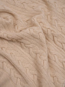 close up of a beige blanket #color_beige