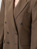 Brown blazer with double-breasted design and button details. #color_sepia