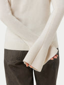 close up of a white cardigan long sleeves #color_coconut-milk