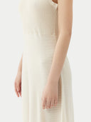 close up of a beige ribbed long dress #color_marshmallow