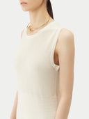 close up of a beige sleeveless crew neck dress #color_marshmallow
