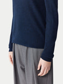 close up of a navy sweater and gray pants #color_total-eclipse