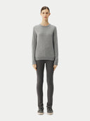 front view of a person wearing a gray sweater and dark pants on a white background
#color_vapor-blue