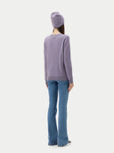 back view of a purple sweater and blue jeans on a white background #color_purple-ash