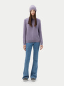 front view of a purple sweater and blue jeans on a white background #color_purple-ash