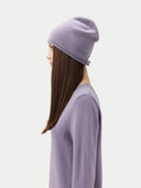 side view of a purple sweater matching beanie #color_purple-ash