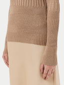 close up of a brown rib, long sleeve sweater with skirt #color_timber-wolf
