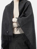 Man wearing a dark gray blanket with fringes on a white background #color_charcoal
