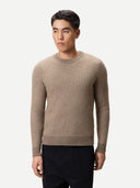 Man wearing a beige textured sweater on a white background #color_taupe