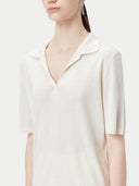 close up of a white polo shirt #color_whisper-white