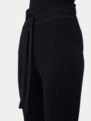 close up of a black rib cashmere pants with rope #color_black
