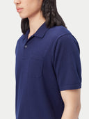 close up of a navy polo shirt #color_navy