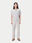front view of a white gray polo shirt with pants #color_wind-chime