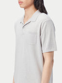 close up of a white-gray polo shirt with pocket in a left breast side #color_wind-chime
