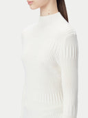 close up of a white rib mock neck sweater #color_whisper-white