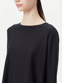close up top side of a black boat neck sweater #color_black