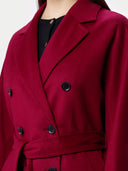 Close-up of a red coat with black buttons on a white background #color_bordeaux