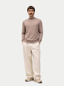 front view of a man wearing a brown sweater and beige pants on a white background #color_timber-wolf