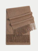 Brown scarf with fringe on a light gray background