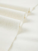 Close-up of white fabric with a soft texture #color_off-white