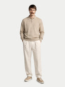 front view of a beige sweater and white pants on a white background #color_warm-grey