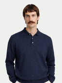 Man wearing a blue long-sleeve shirt against a white background #color_navy
