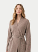 close up front view of a woman wearing a brown robe against a white background #color_taupe