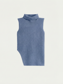 Blue ribbed knit sleeveless turtleneck top on a light gray background #color_dusty-blue