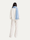 back view of a light blue scarf and white outfit on a white background #color_english-manor