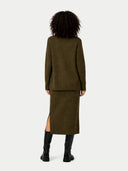 back view of a person wearing a green suit with a white background #color_capulet-olive