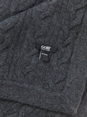 close up of a gray blanket with label "GOBI"  #color_charcoal