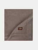 Brown blanket with a 'Gobi' logo on a light gray background.