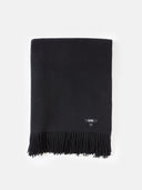 Black throw blanket with fringes on a white background.