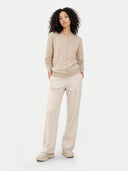 front view of a beige cardigan and pants on a white background #color_warm-grey